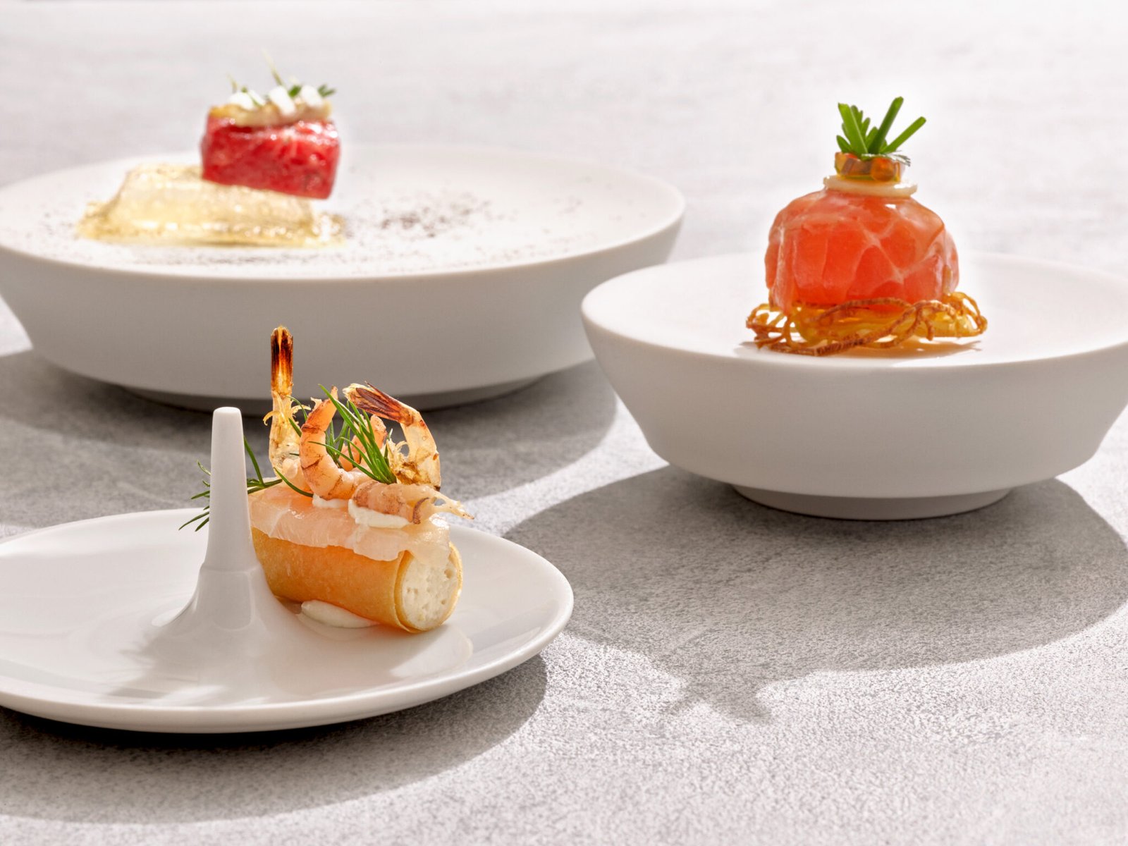 Drei Gourmet-Vorspeisen im Söl’ring Hof – ein Urlaubsgenuss auf Sylt.
